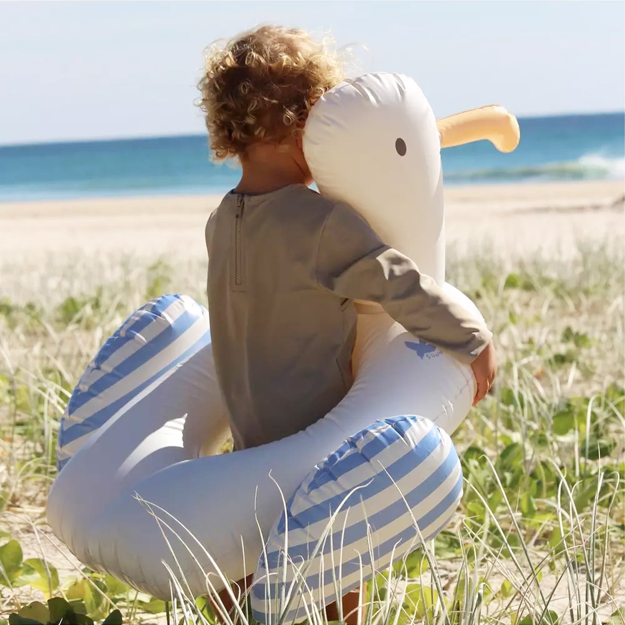 A seagull shaped pool ring float. 