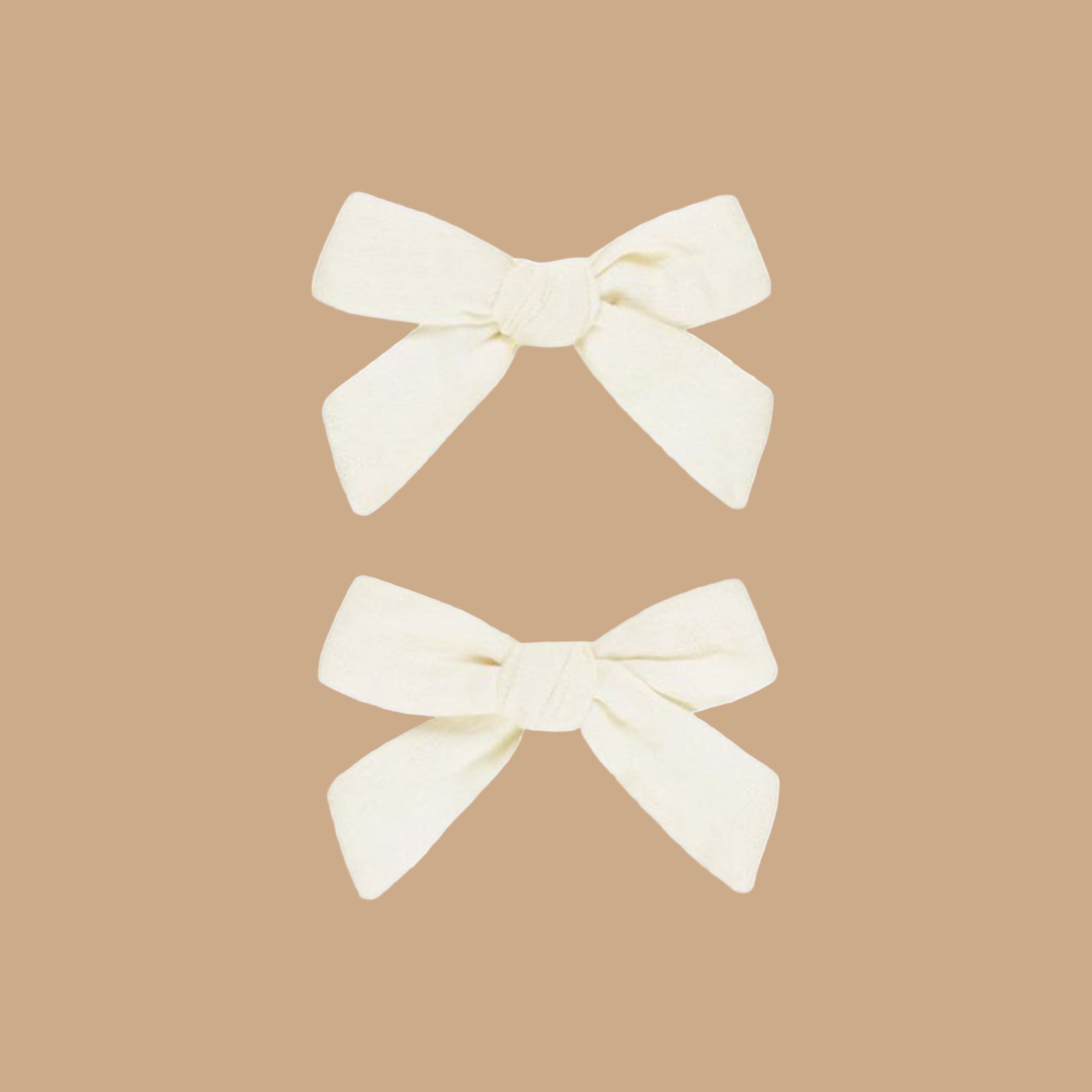 A pair of ivory bows
