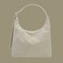 A super pale green nylon shoulder bag. 