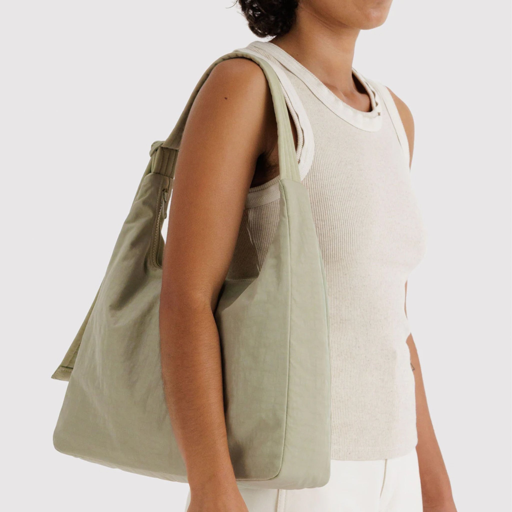 A super pale green nylon shoulder bag. 