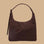 A chocolate brown nylon shoulder bag.