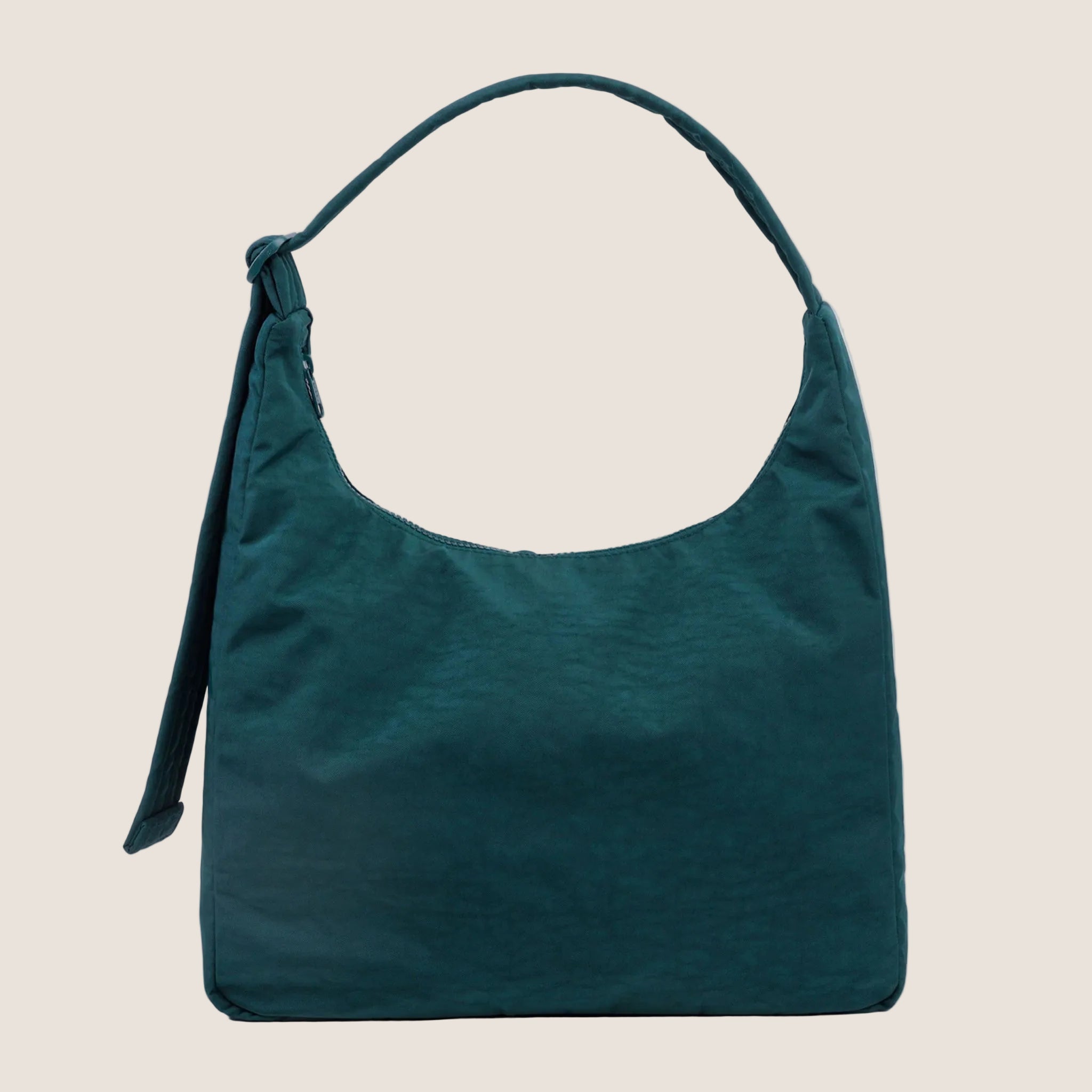 A dark teal nylon shoulder bag. 