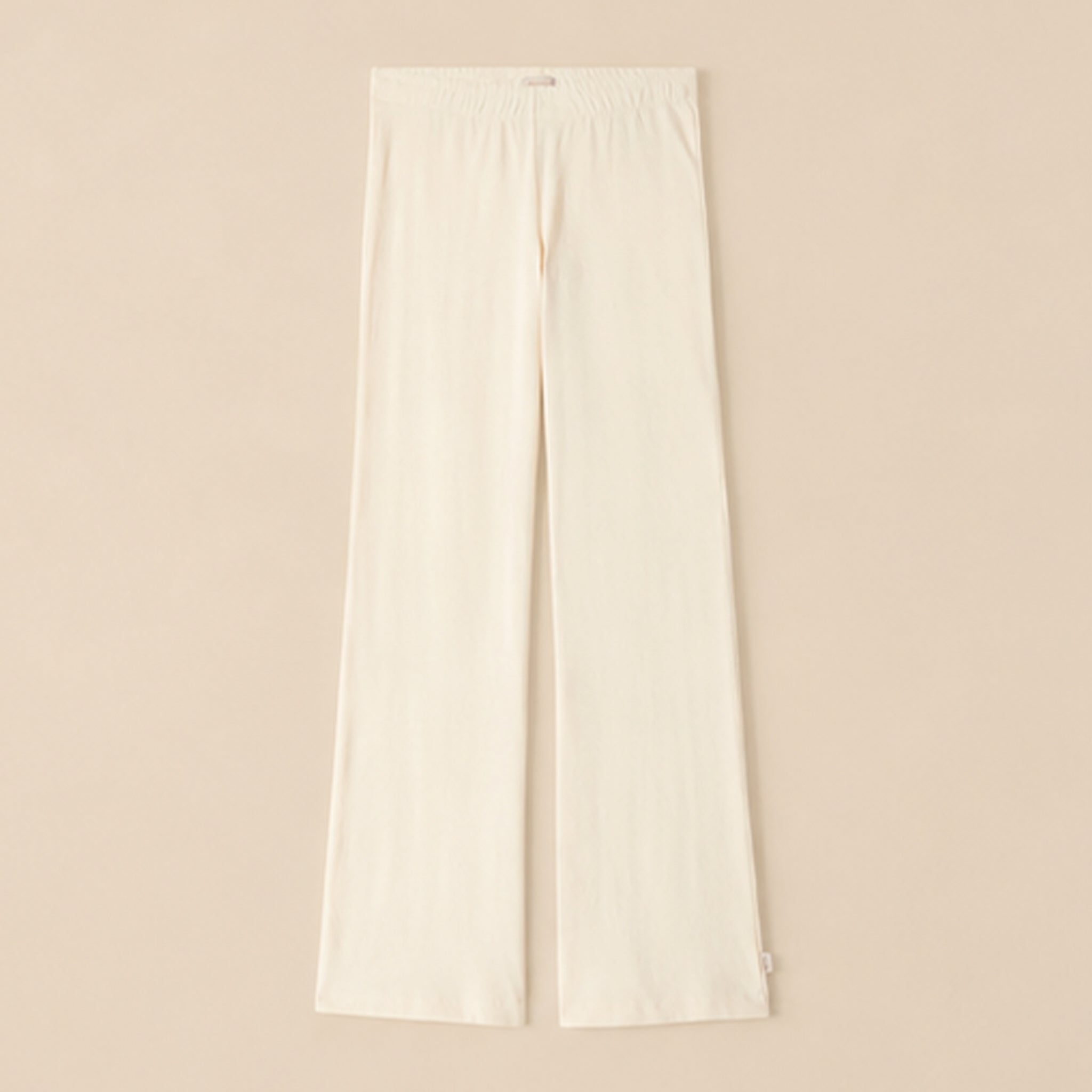 A pair of white knit pants. 