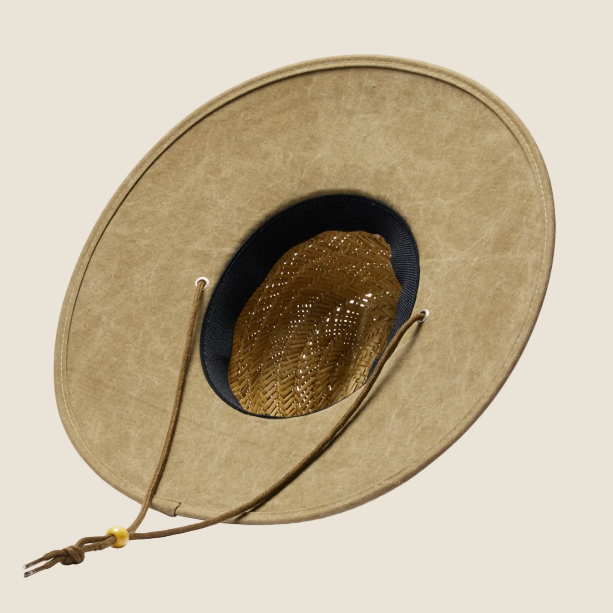 A straw hat with a solid olive green brim. 