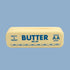  A stick of butter shaped silicone pouch with text that reads, "Salty & Sweet Butter Me Up Grad AA Stuff".