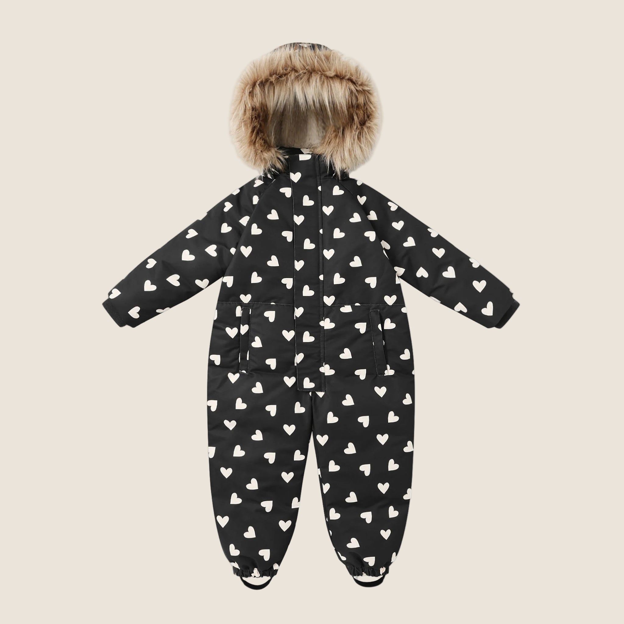 A black ski suit for kids with a fur lined hood. 