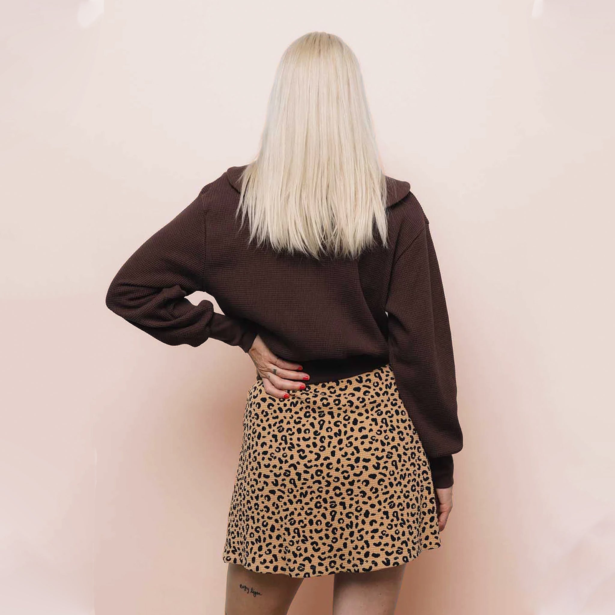 A waffle knit leopard print skort with an interior pocket.