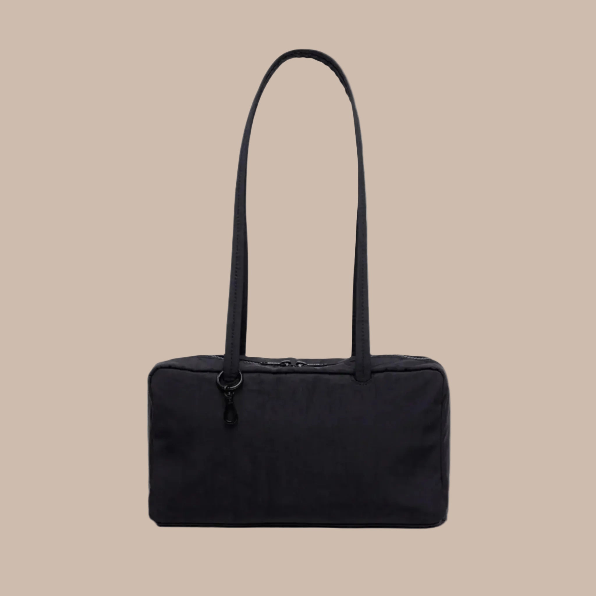 A black thin shoulder bag with a shoulder strap and thin body. 
