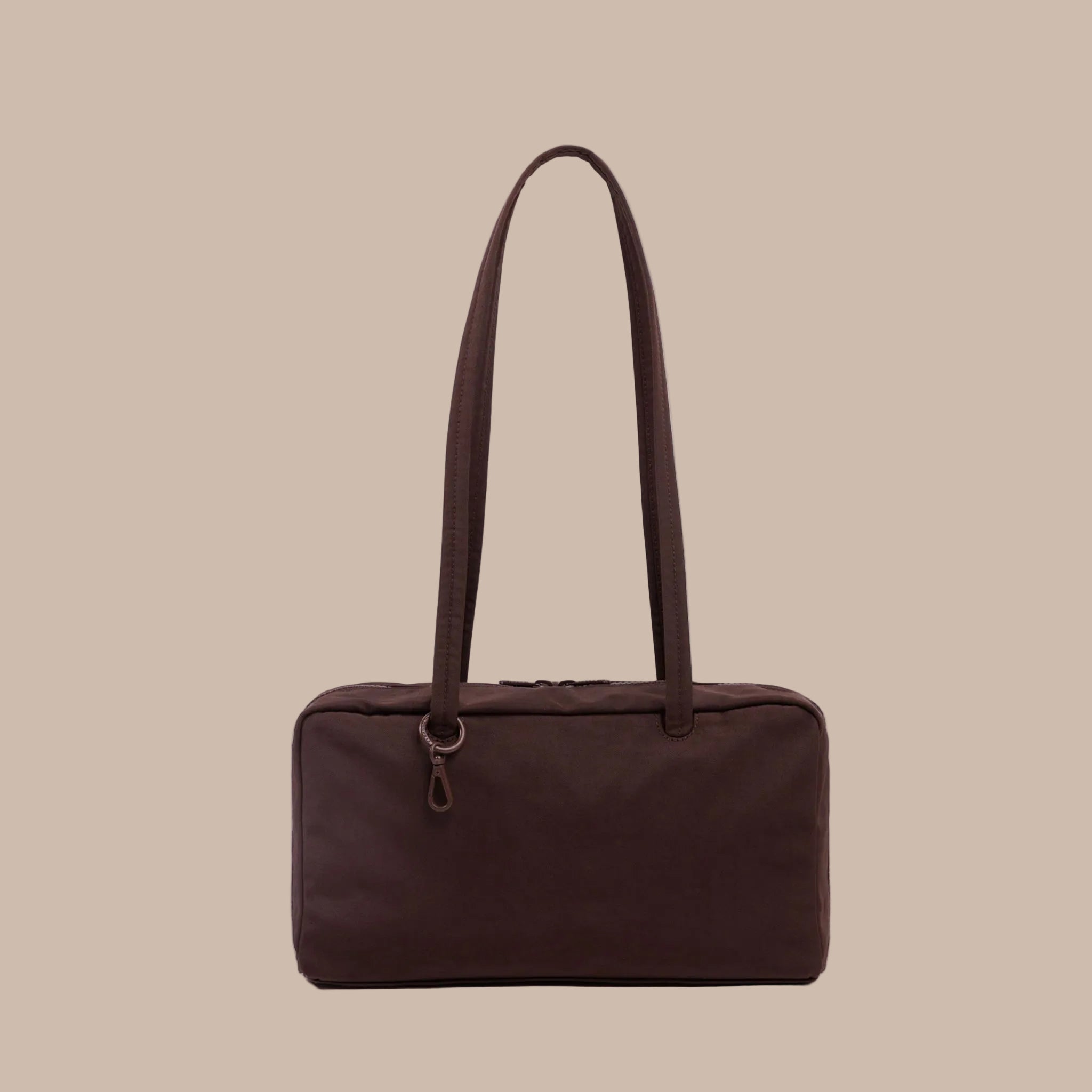 A dark brown nylon rectangle shaped shoulder bag. 