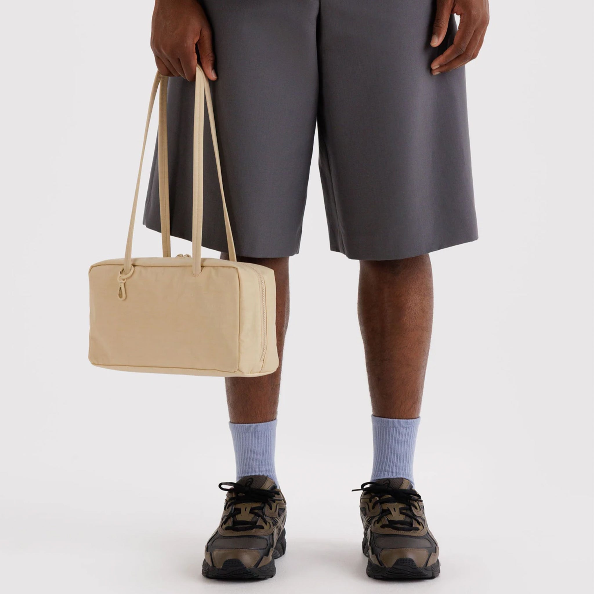 A pale yellow rectangle shoulder bag. 