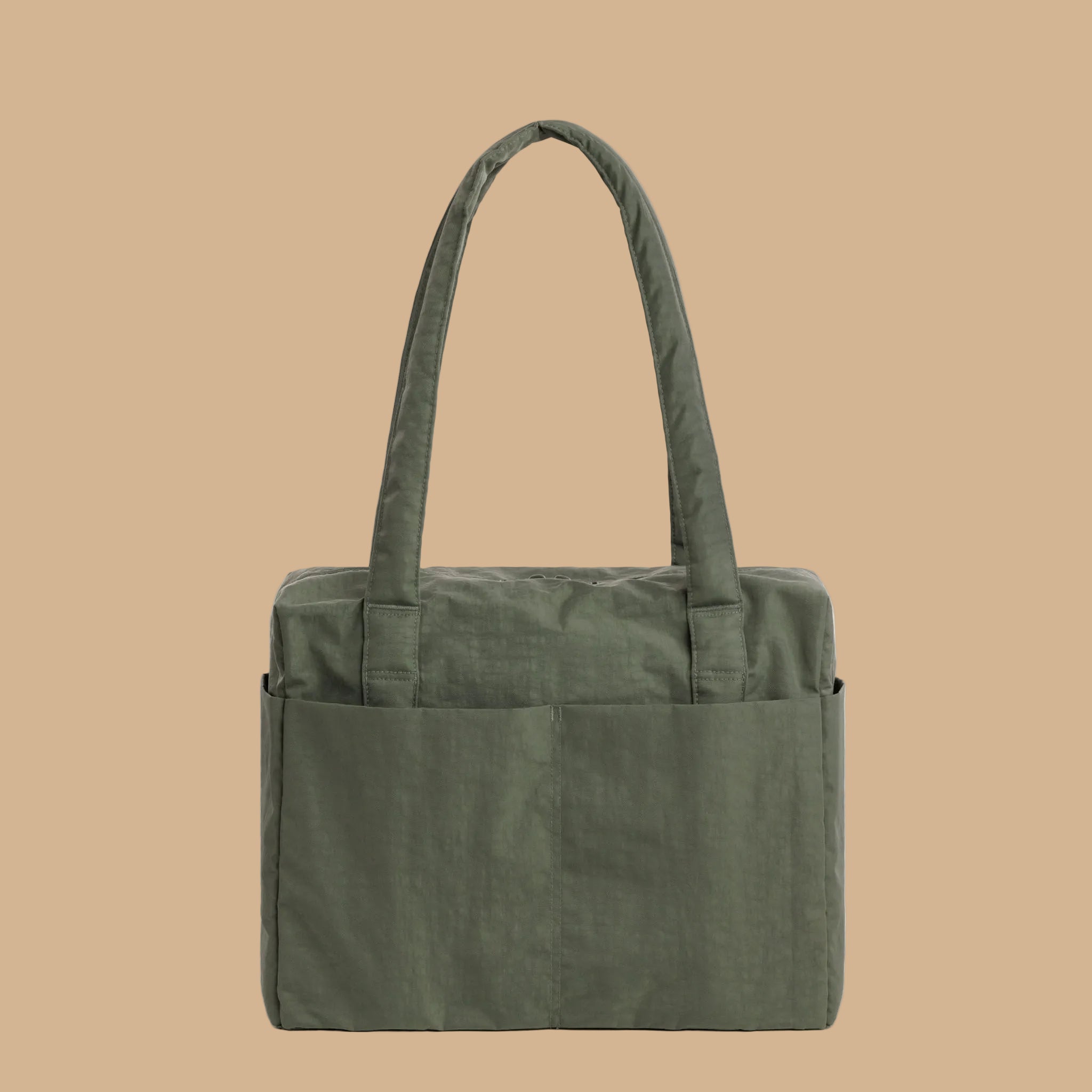 A green nylon small carry on bag.