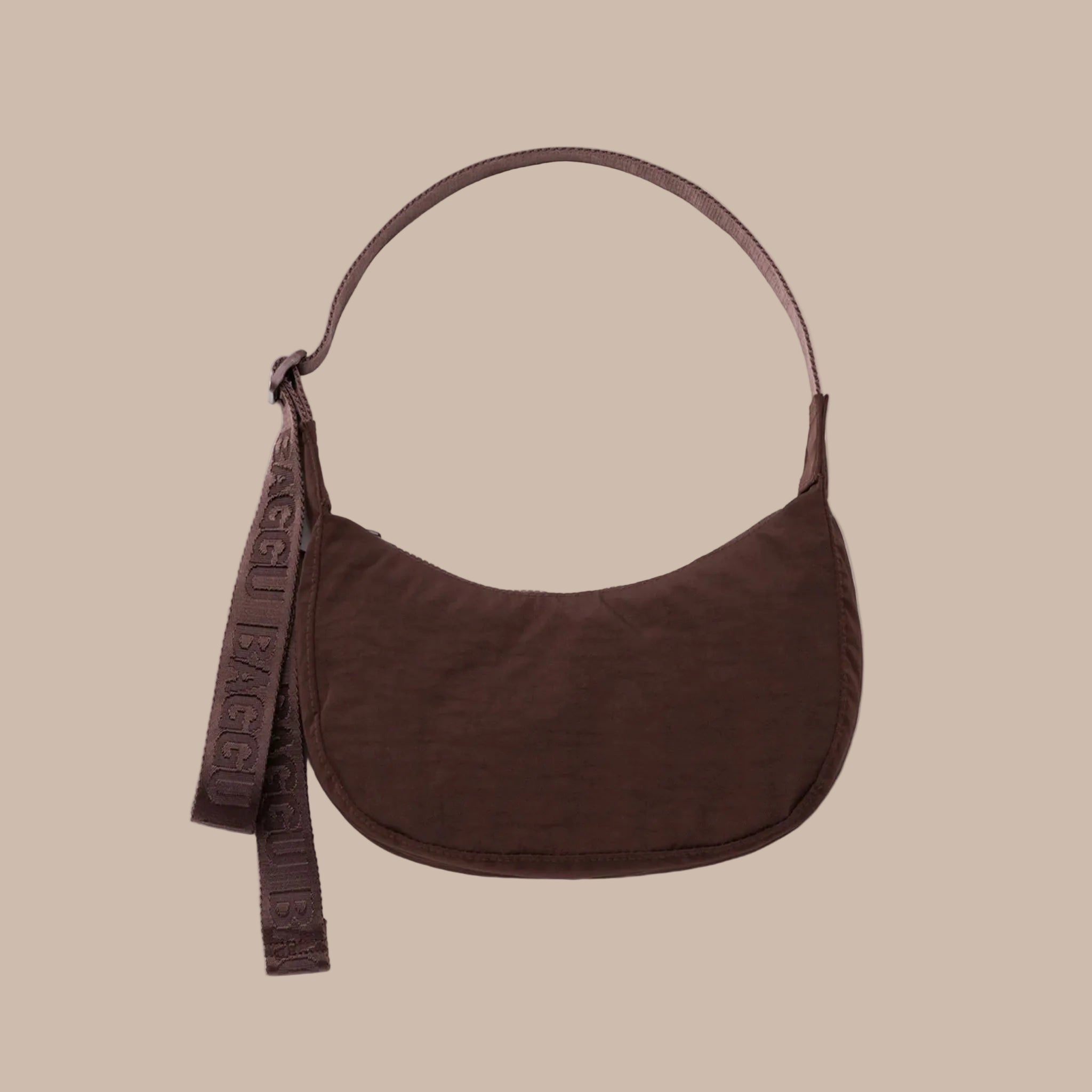 A small brown nylon crescent shaped bag. 