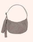 A grey / tan nylon handbag with an adjustable strap to make it a crossbody or a shoulder bag.