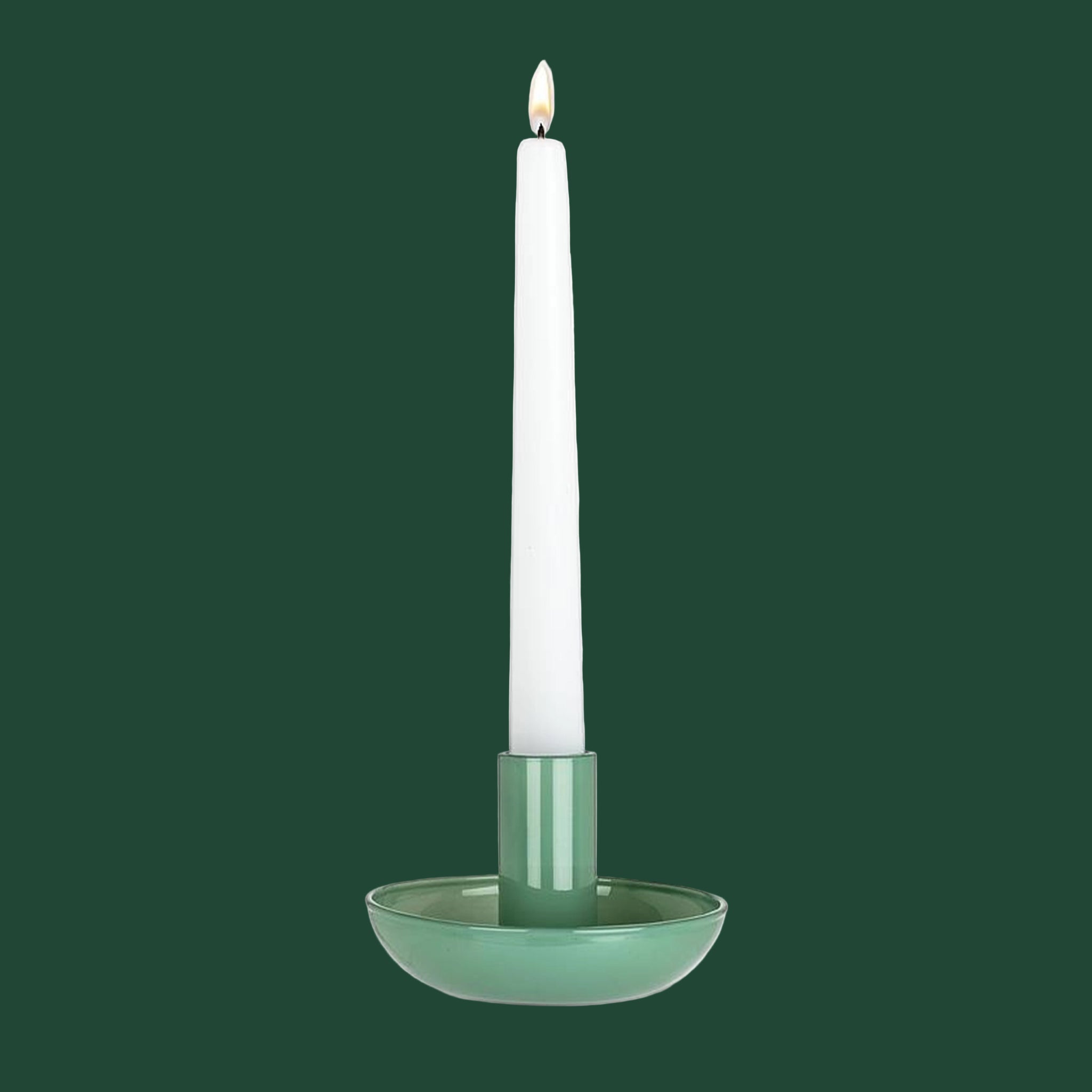 A green ceramic taper candle holder. 