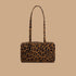 A nylon leopard print shoulder bag. 