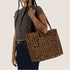 A leopard print nylon cloud tote bag. 