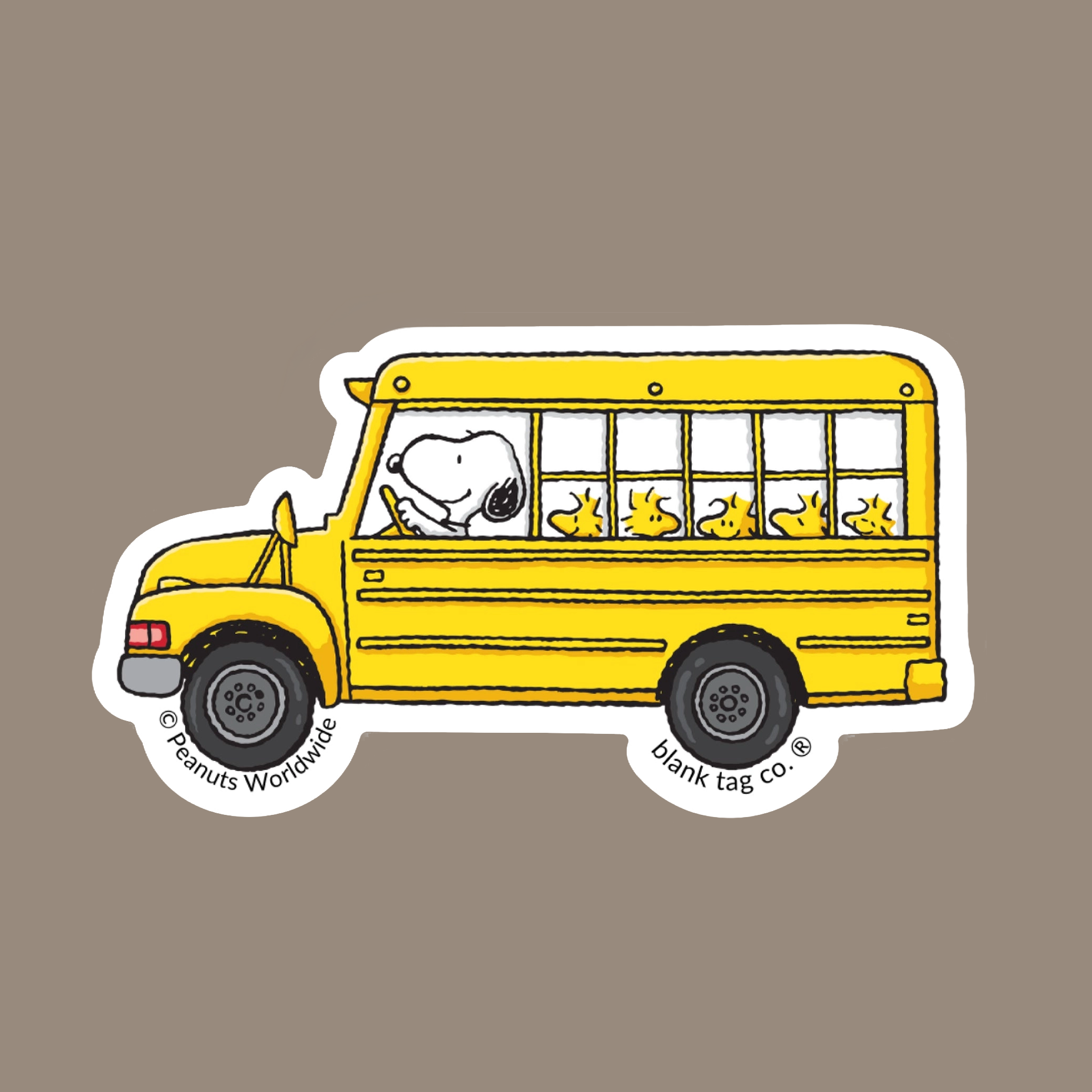 A sticker of a schoolbus being driven by snoopy with little woodstock's poking their heads out the back.
