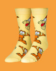 On an orange background is a yellow pair of socks with a garfield print.