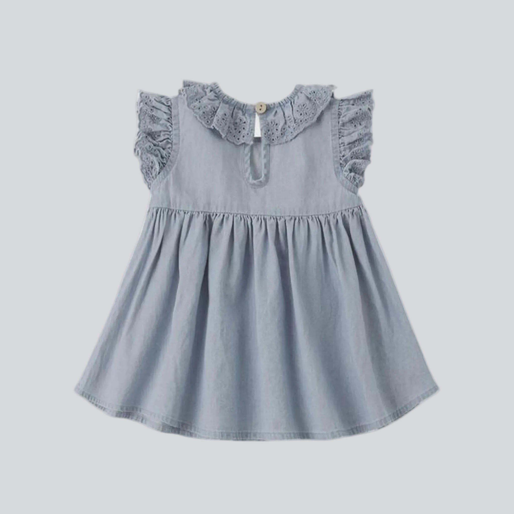 A denim blue colored ruffle dress for babies and kids. 