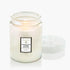 A white glass jar candle sits on a white background.  The candle label reads, " Sparkling Cuvee"