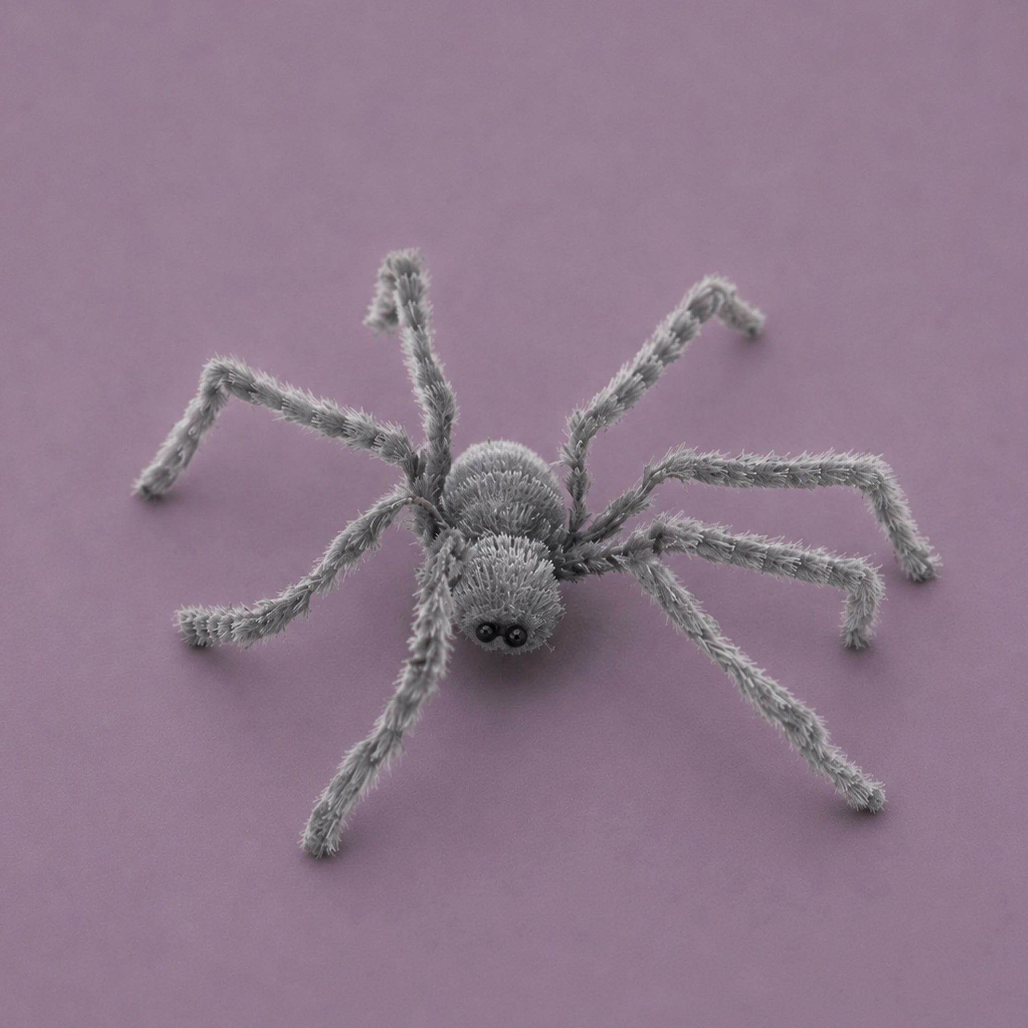 A grey spider halloween decoration. 