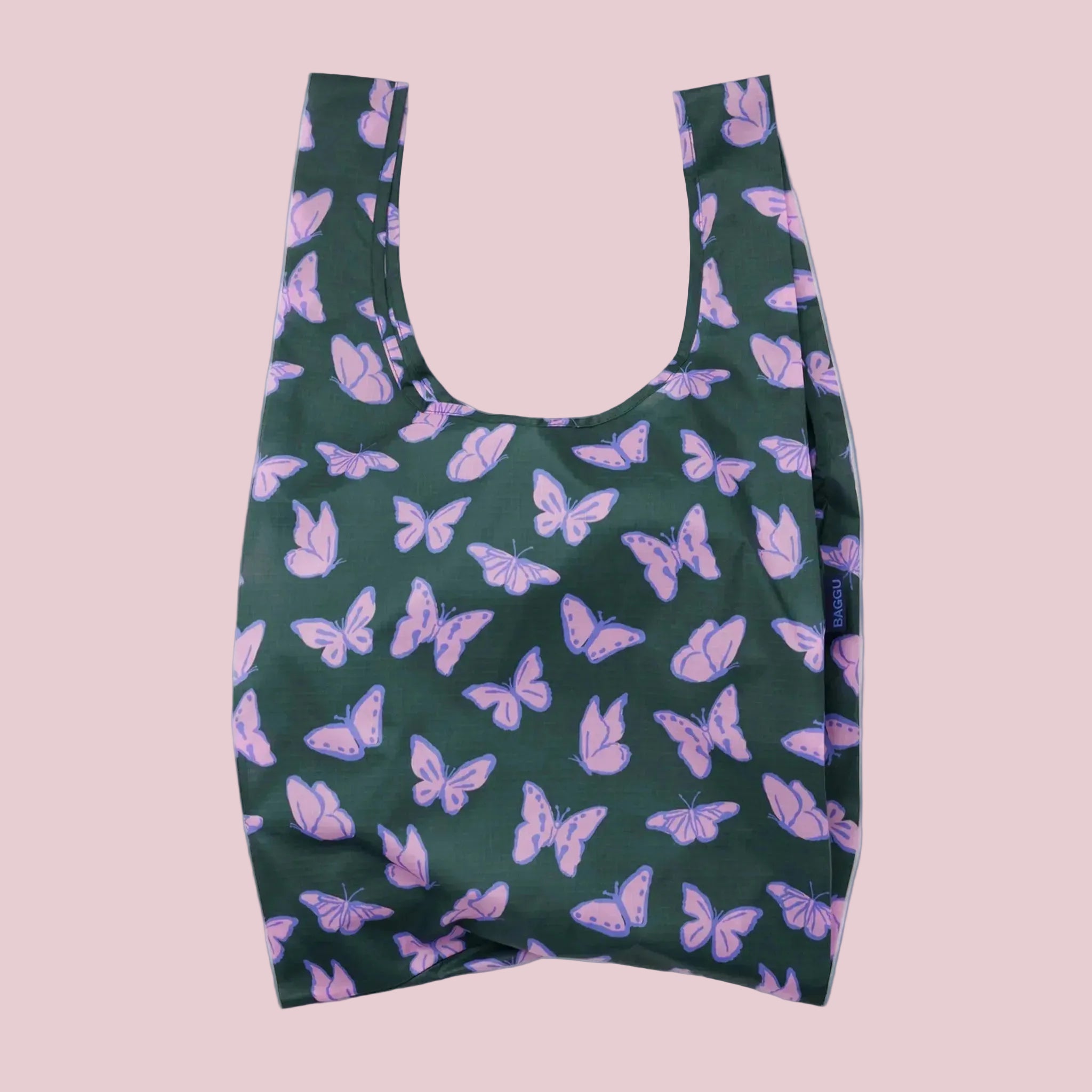 A green and purple nylon tote bag with a butterfly print. 