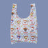 A nylon tote bag with a hello kitty and friends western pattern. 
