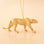 Gold wild cat ornament. The cat is standing. 