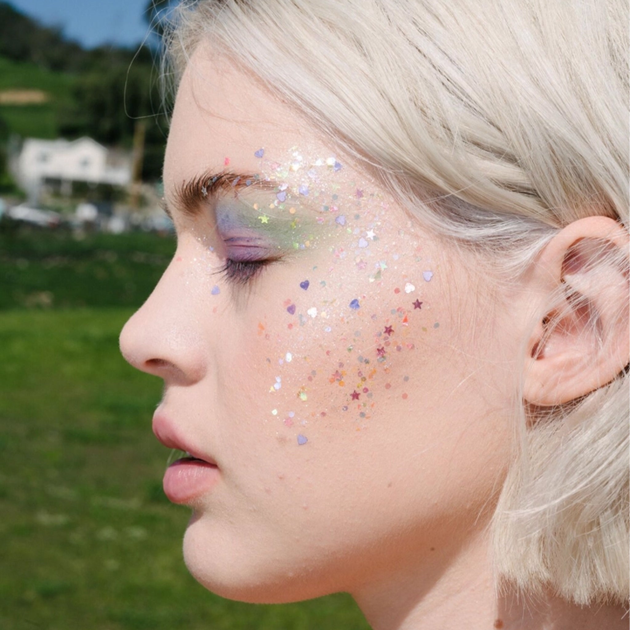 A clear jar of gel star glitter. 