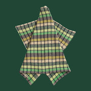 A green check waffle knit tea towel. 