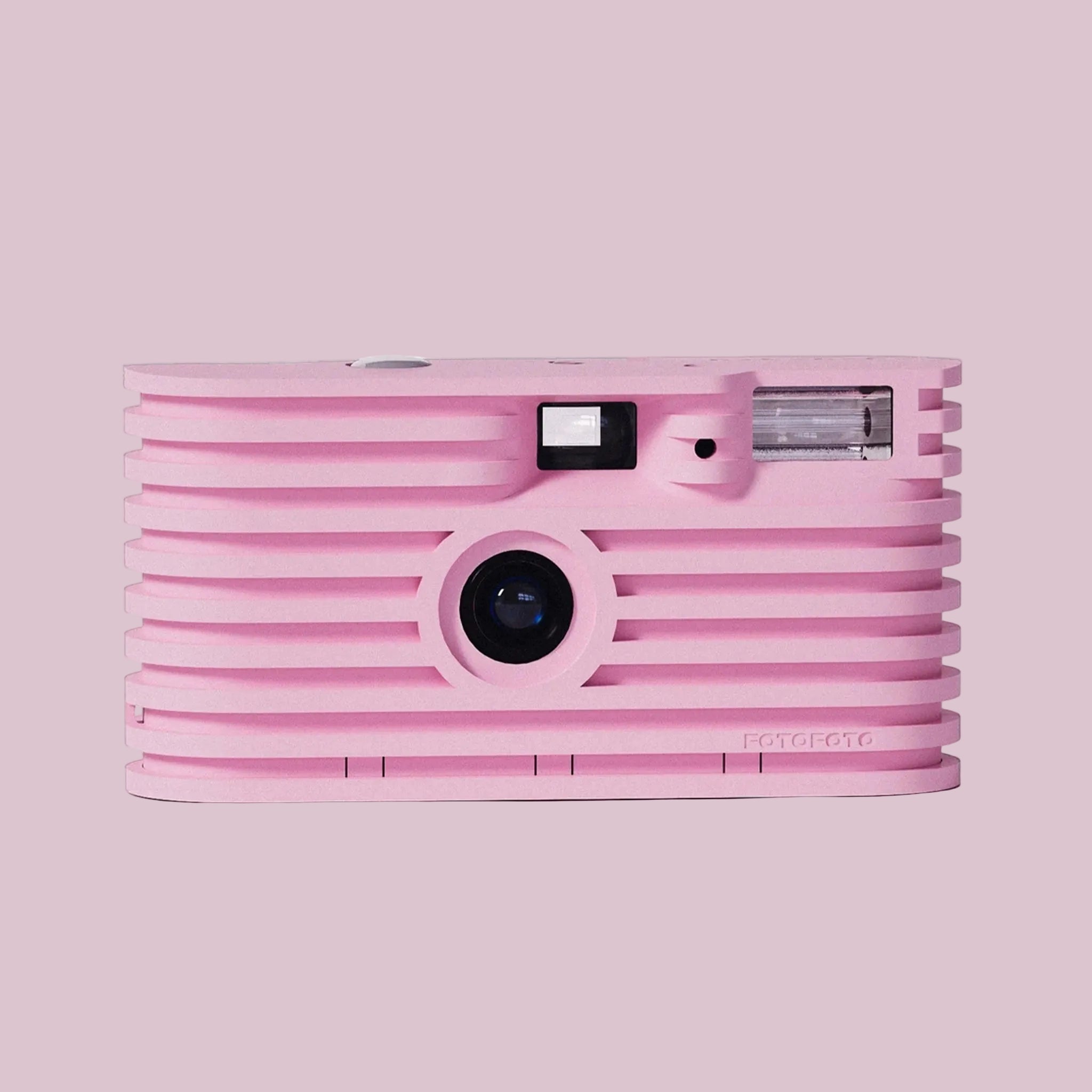 Pink disposable camera on a white background