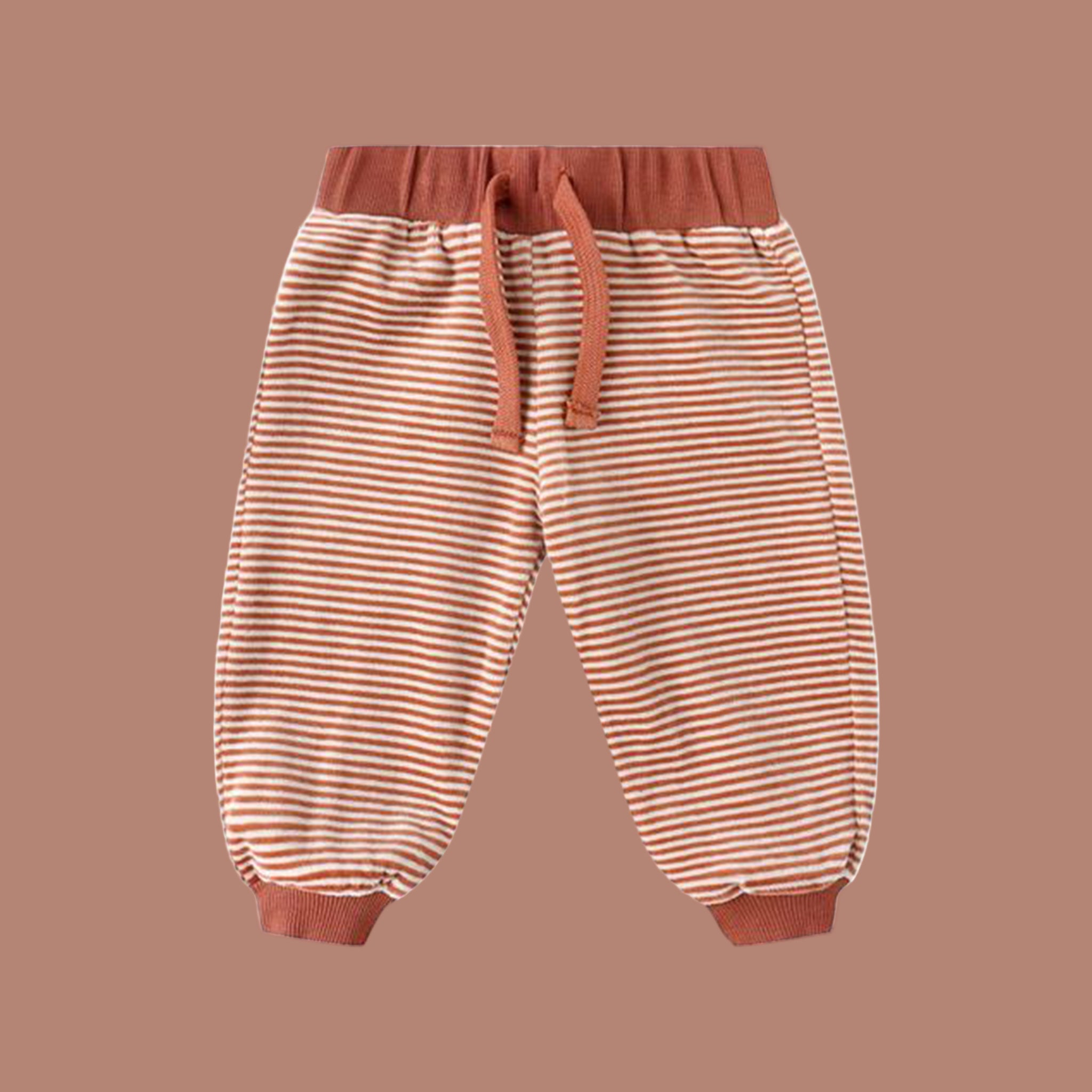 A rust red and cream mini stripe velour pair of sweatpants