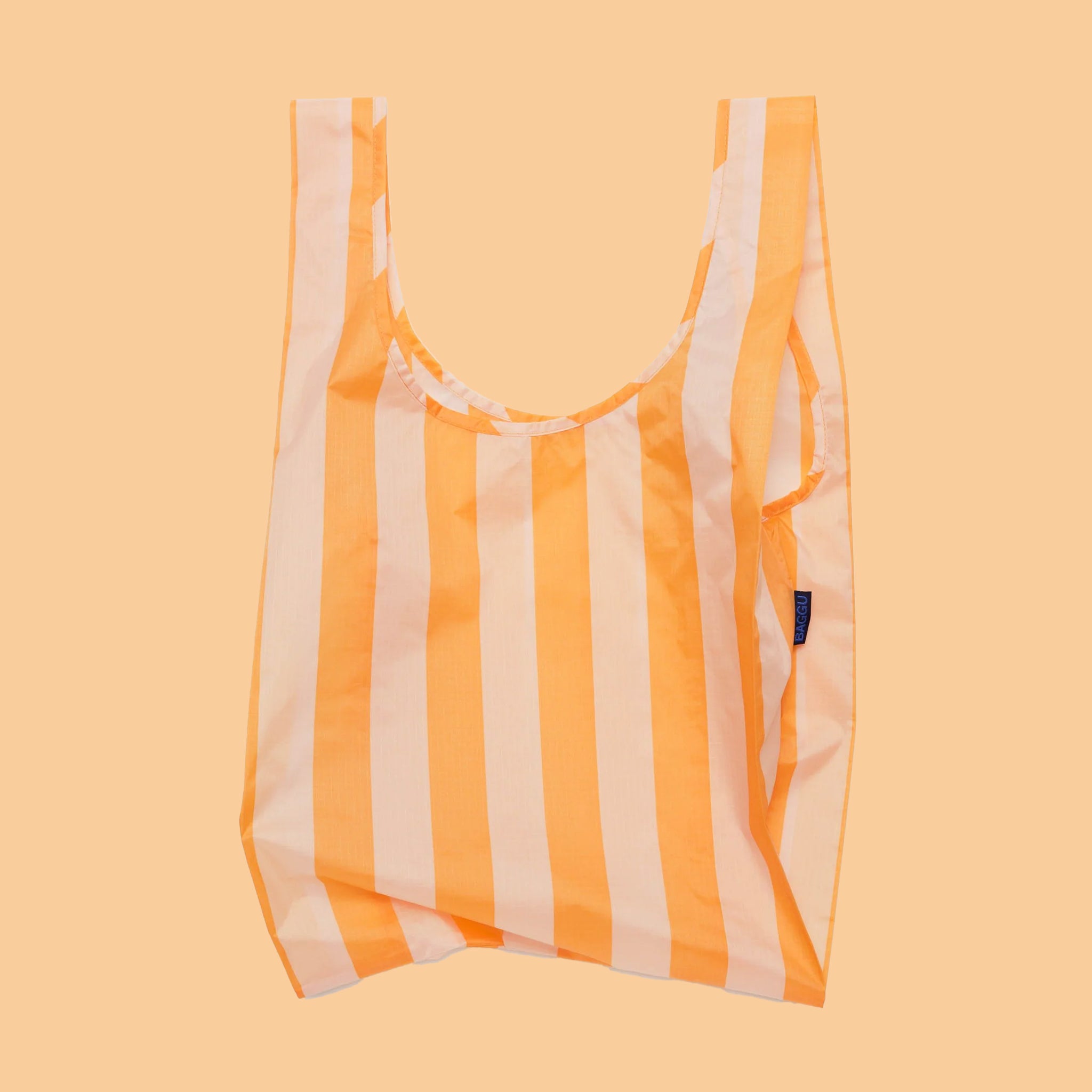A nylon reusable bag with tangerine wide stripes. 