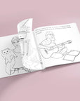 On a pink background is the coloring book open to a page showing some of the illustrations of Taylor in the book. 