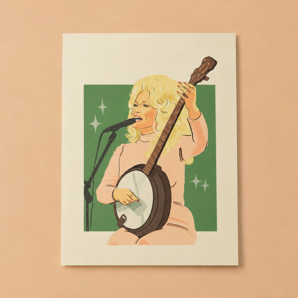 An art print of Dolly Parton signing and holding her banjo with a green background and her in pink. Frame not included. 