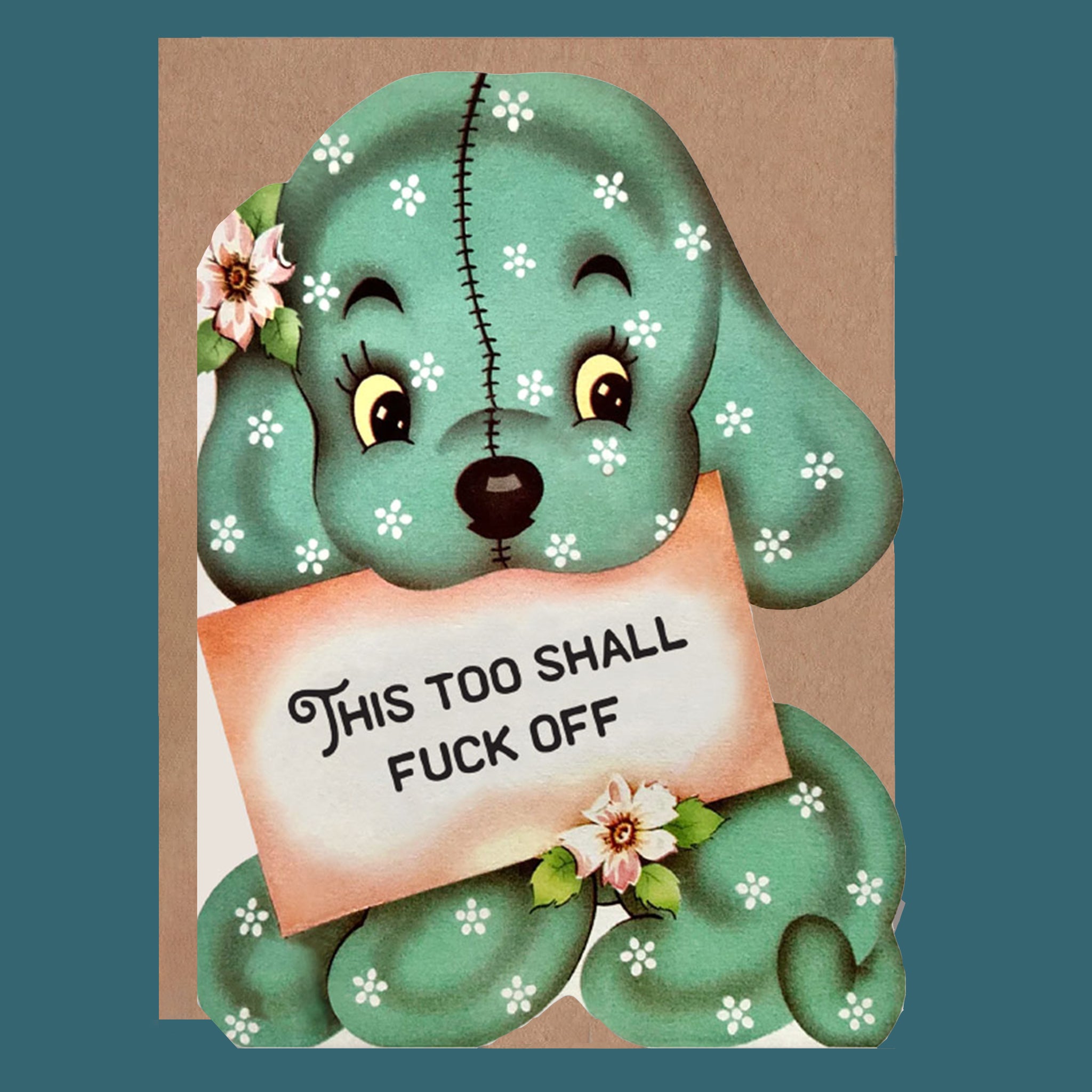 A green puppy dog shaped card that is holding a letter that reads, 'This Too Shall Fuck Off' 