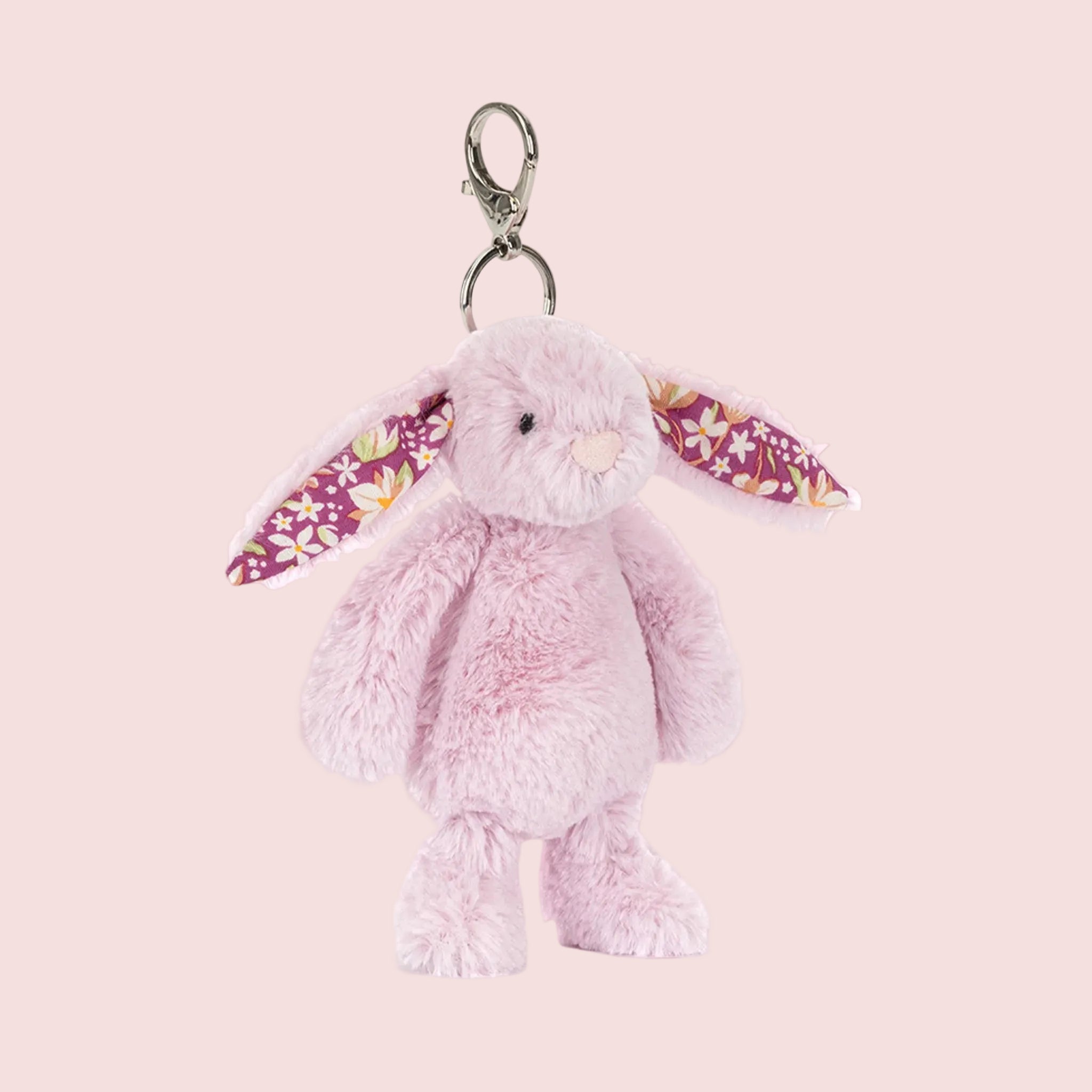 A light purple bunny shaped stuffed animal keychain bag charm. 