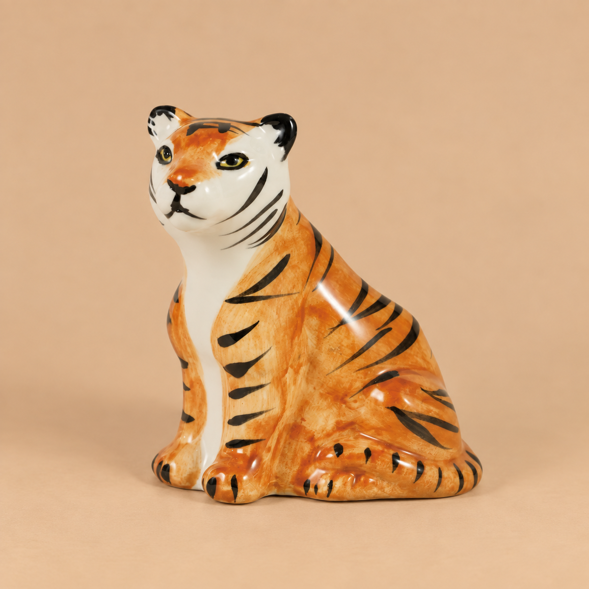A tiger shaped ceramic shaped vase.