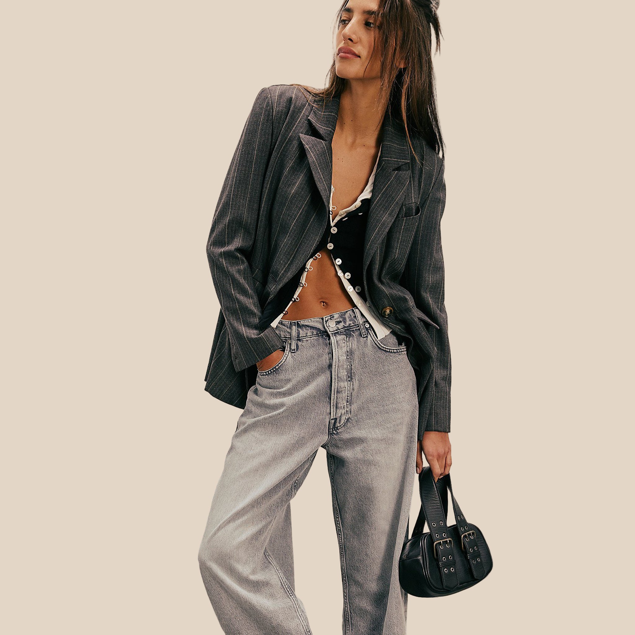 A long sleeve button up shirt layered with a white version underneath. 