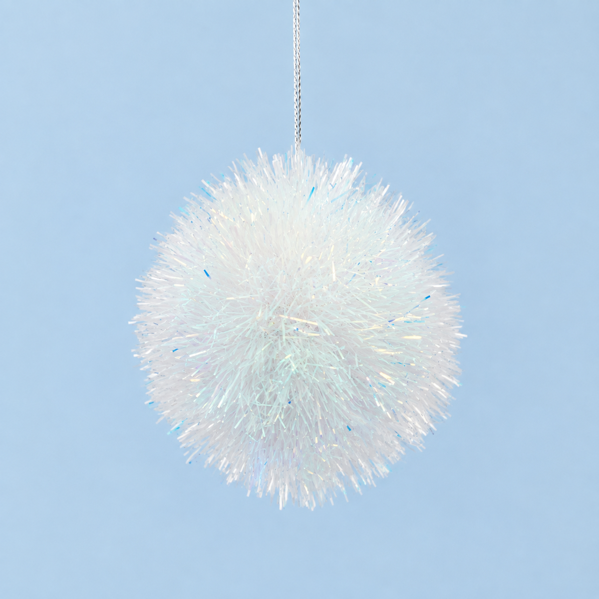A iridescent tinsel ball ornament. 