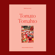 A light pink box filled with a tomato themed puzzle with beautiful red hues and imagery. 
