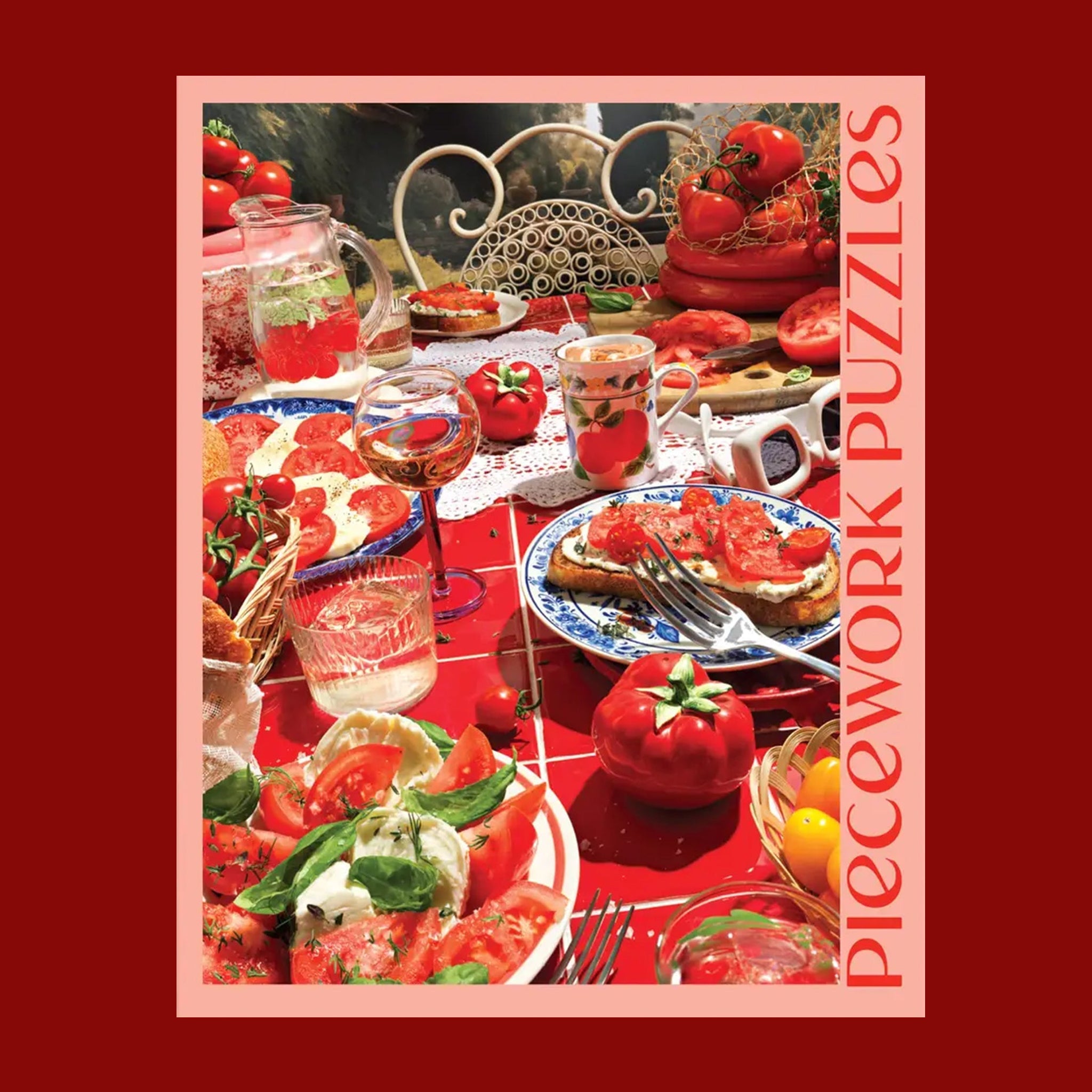 A light pink box filled with a tomato themed puzzle with beautiful red hues and imagery. 