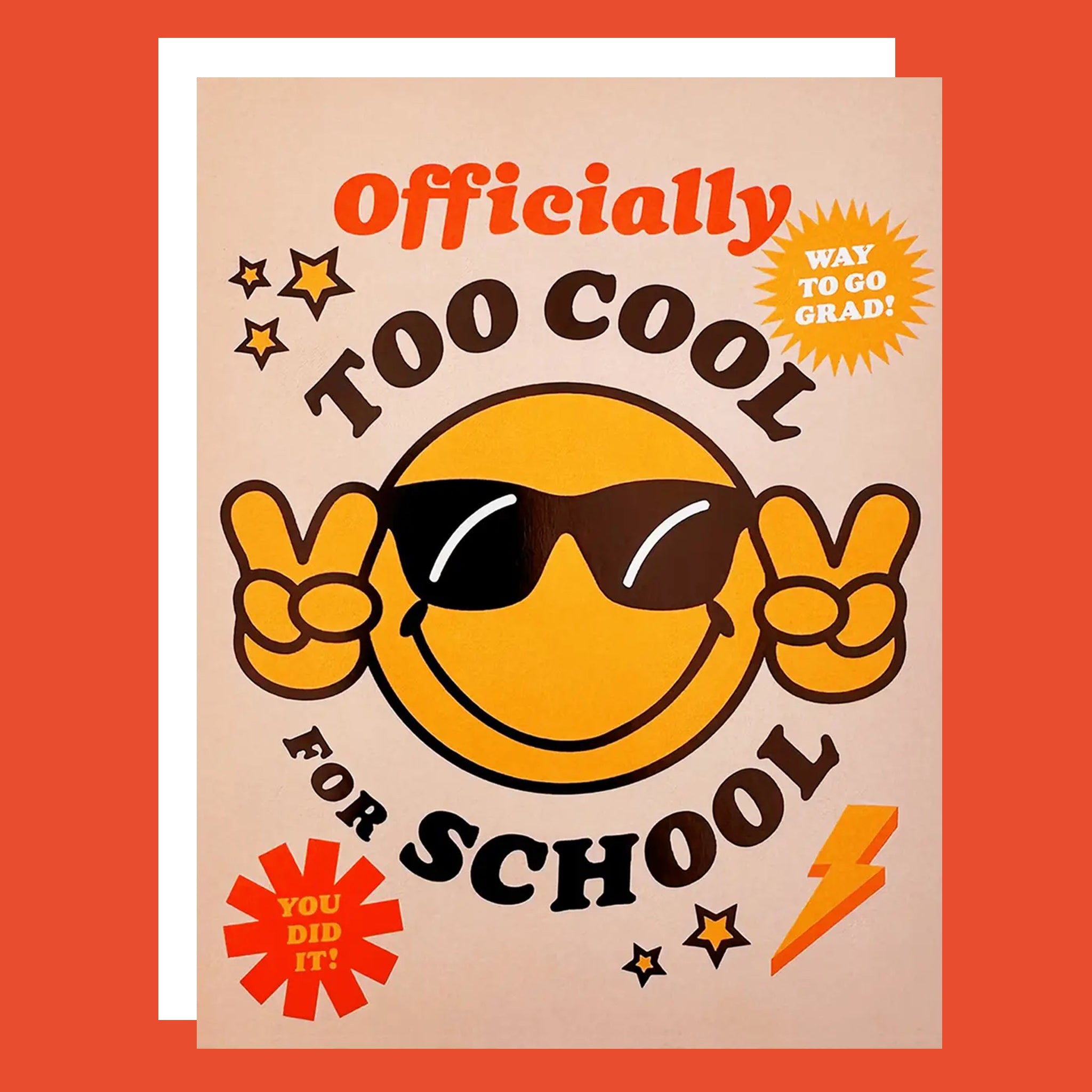 Greeting card with a smiley face on the cover. The smiley face is holding up peace signs and is wearing sunglasses. The card reads "Officially Too Cool For School".