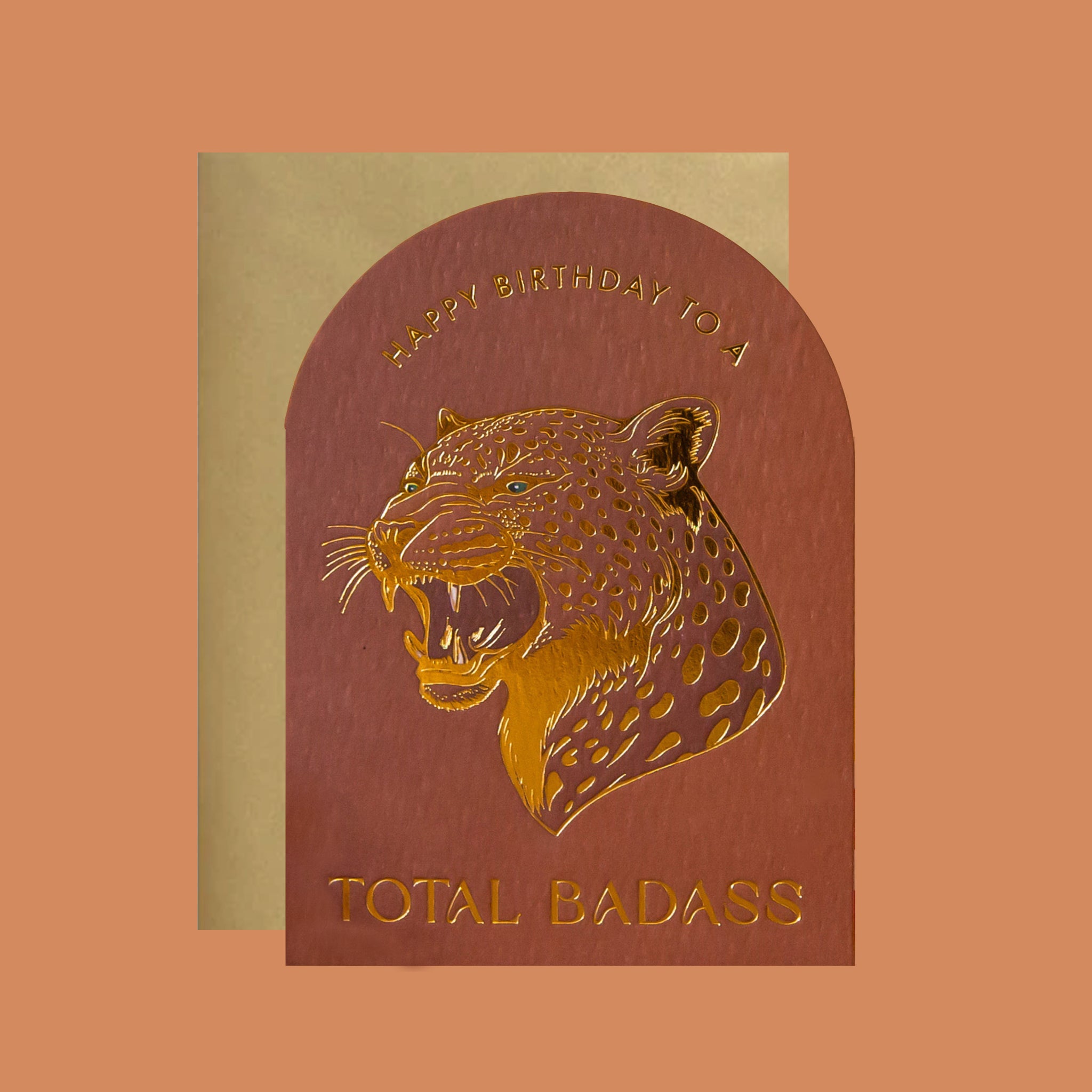 Birthday card with gold panther design and text on a brown background