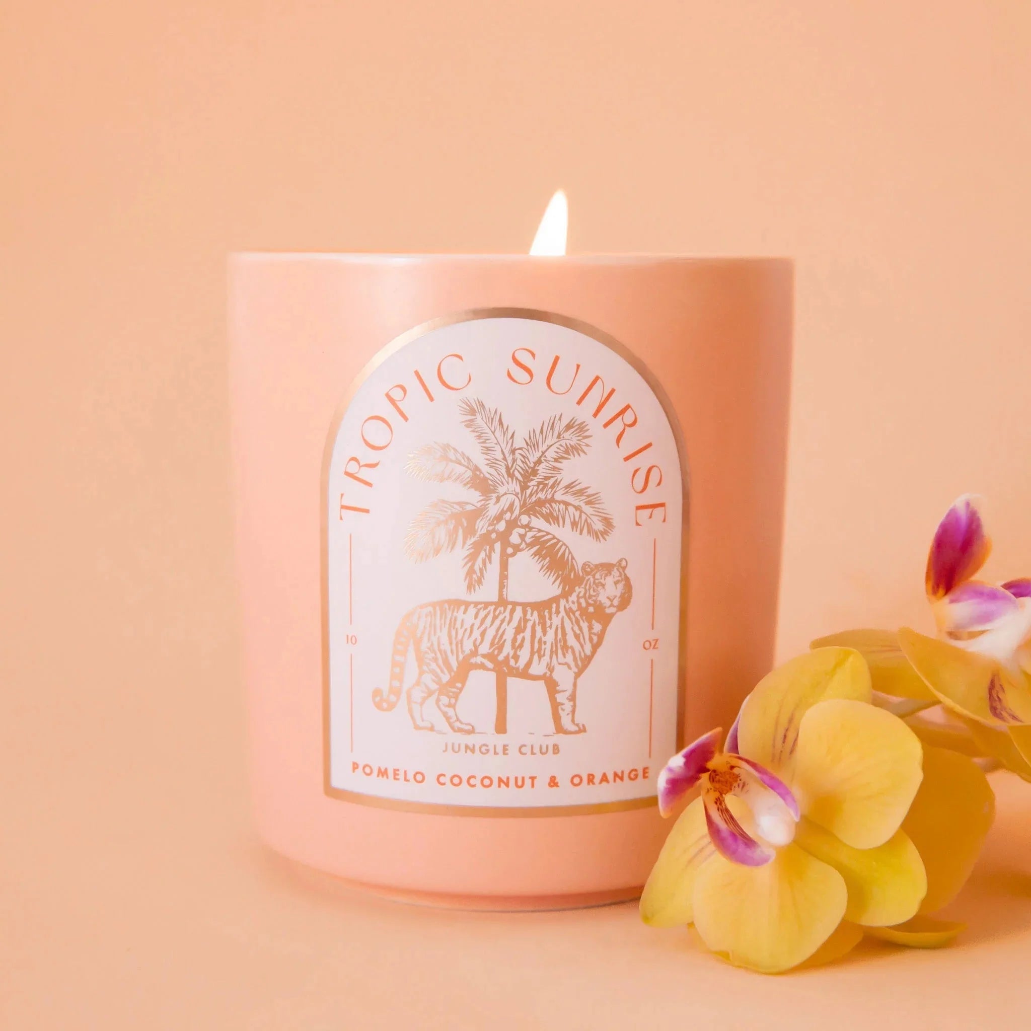 "Tropical Sunrise Pomelo Coconut & Orange" candle. 
