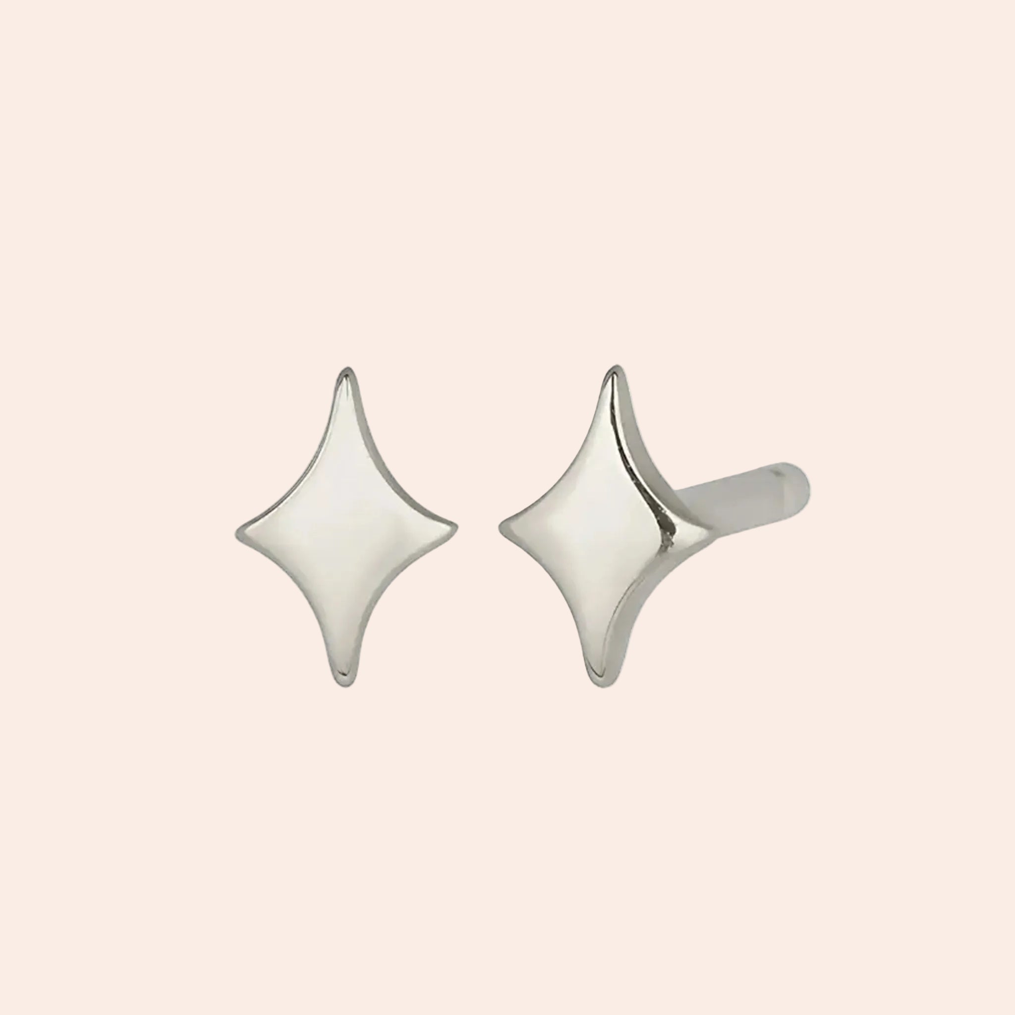 A silver pair of twinkle star shaped stud earrings. 