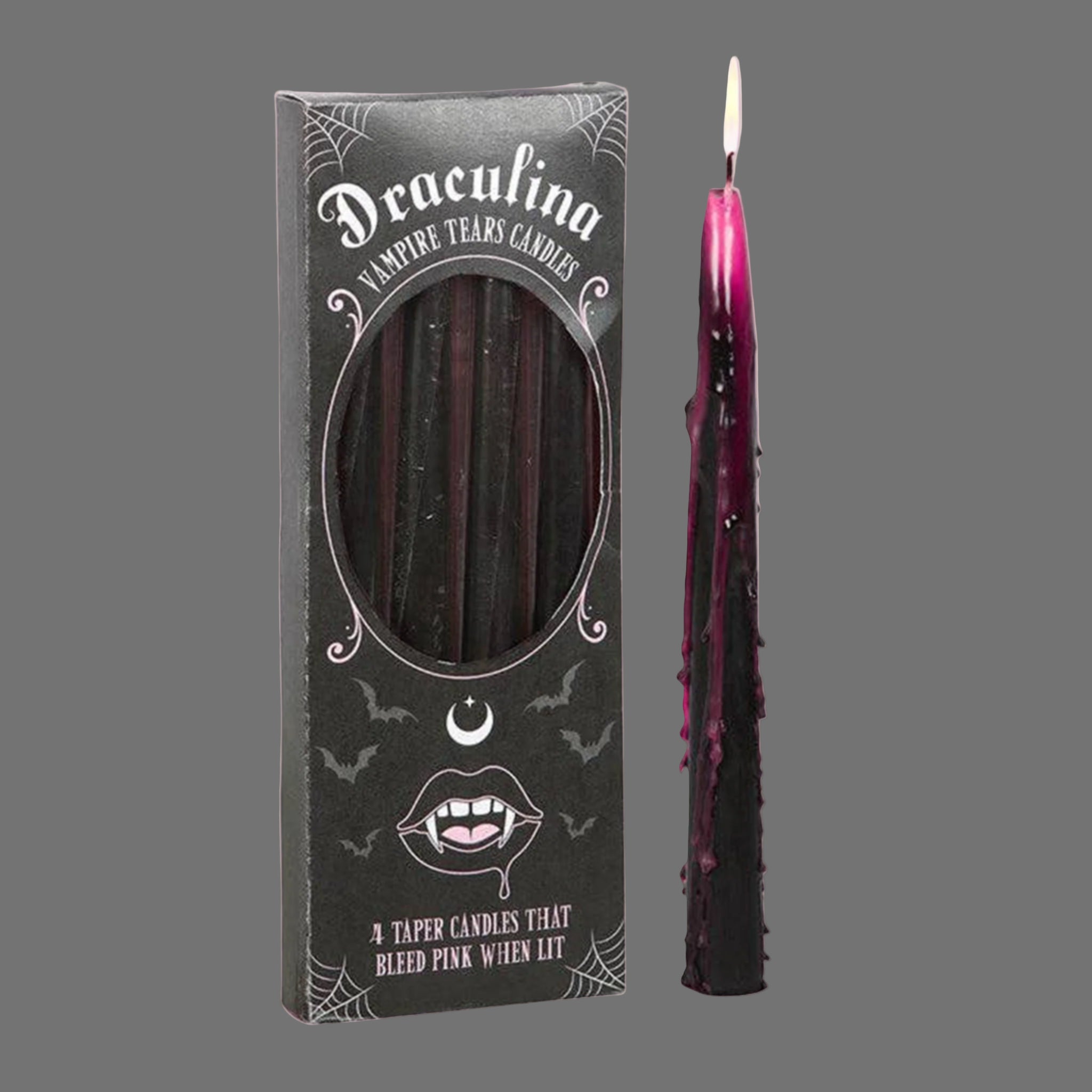 A set of four black taper candles with with dark pinkish purple wax that drips when the candles are lit. 