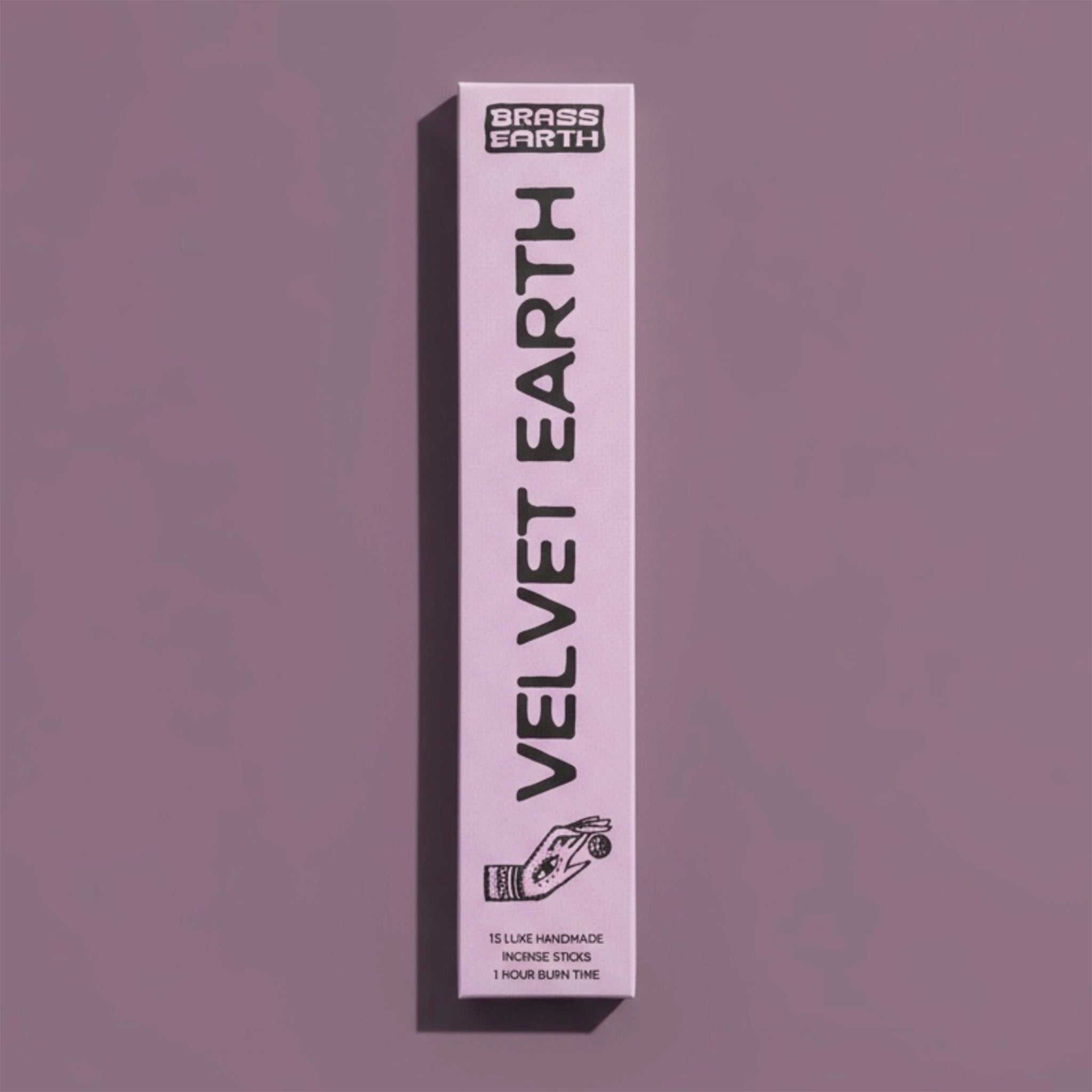Velvet Earth incense stick packaging on a purple background