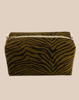 A olive greenish/brown canvas cosmetics case with a black zebra stripe pattern. 