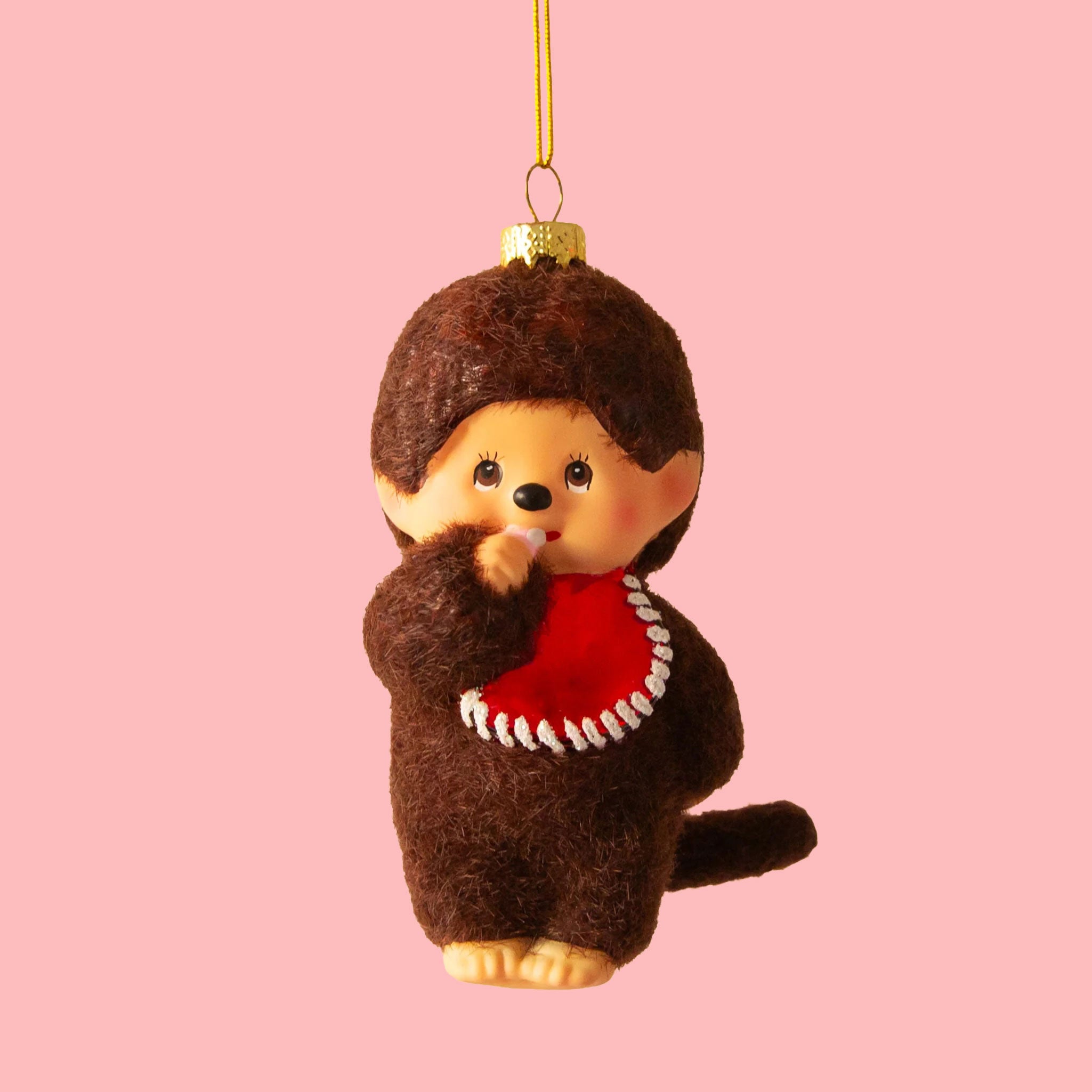 A vintage inspired monchichi monkey doll shaped ornament. 